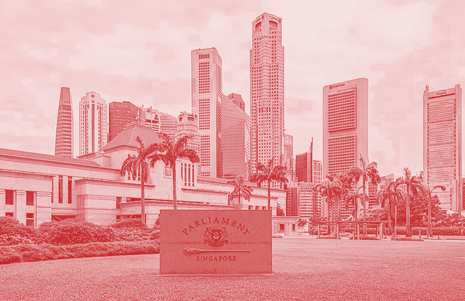 A photo of Singapore's Parliament with large buildings in the background